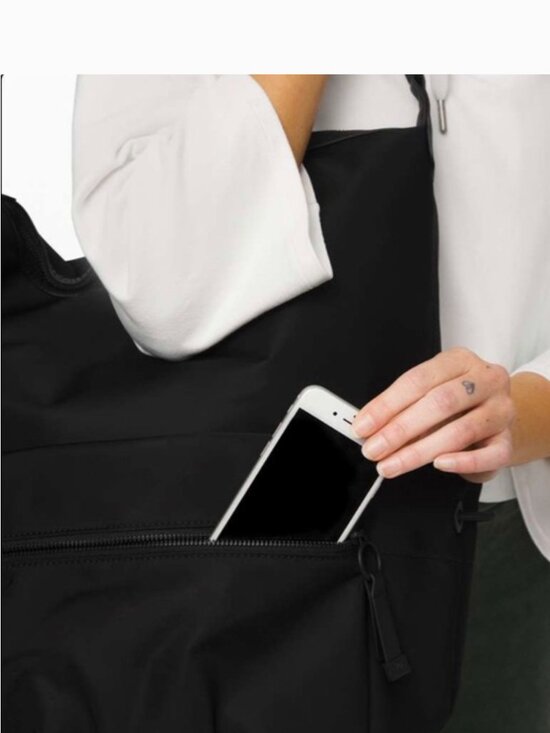 lululemon easy days backpack 20l Practice Karma Medium snacks or notes from admirers Two side pockets for water bottles or gear Interior padded sleeve that fits a 13” laptop or iPad Cushioned exterior zip pocket that fits a 14 laptop for easy access and security Adjustable straps to customize the fit Top grab handle for hanging and carrying ease Luggage sleeve to make this the perfect travel companion And so many other extras first lulu purchase! Coral Easy